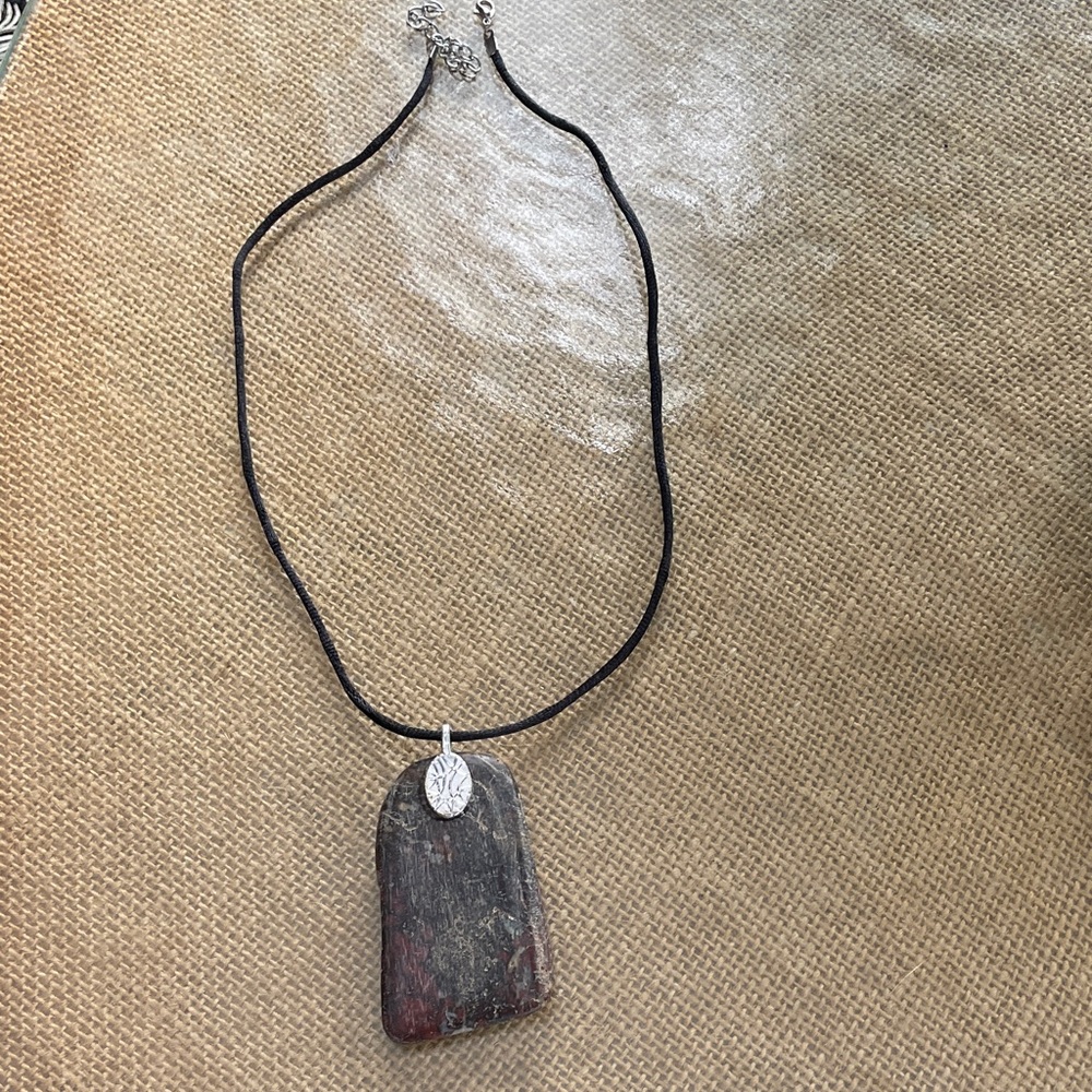 Handcrafted ancient petrified wood mined in Panama on adjustable cord